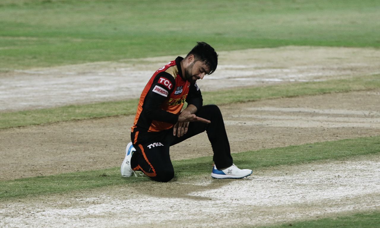 Rashid Khan kneels on the pitch, Chennai Super Kings vs Sunrisers Hyderabad, IPL 2021, Sharjah, September 30, 2021