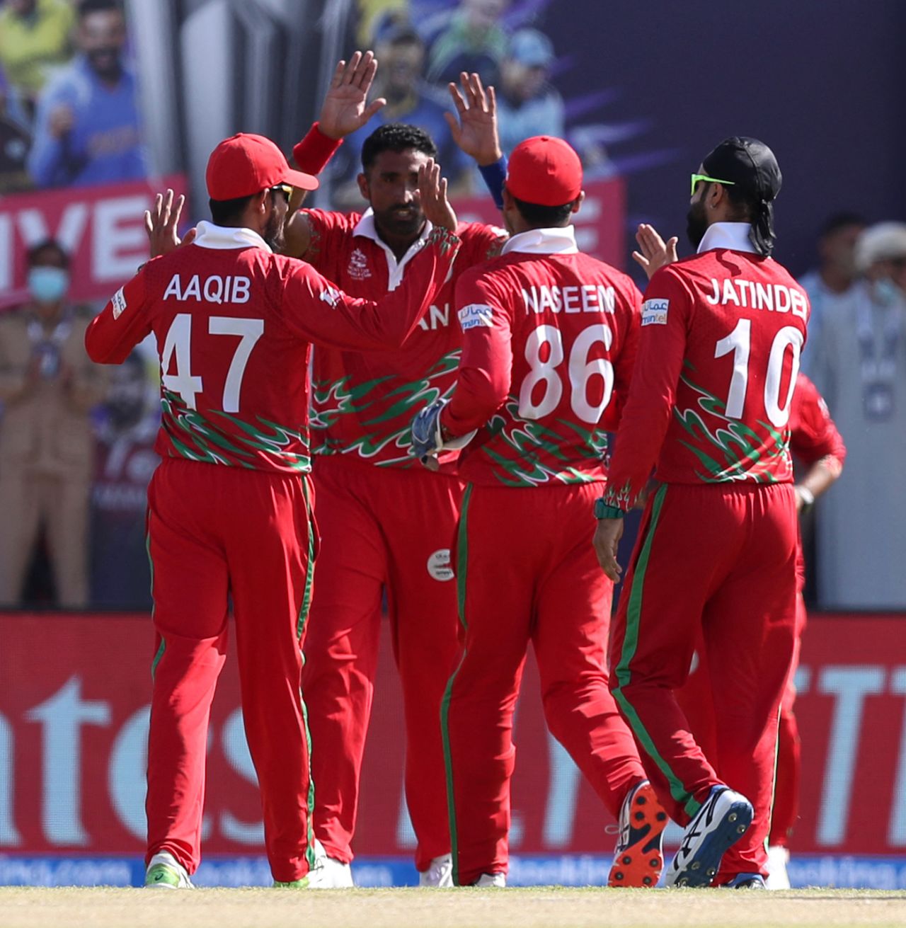 Kaleemullah celebrates a wicket with his team-mates, Oman vs Papua New Guinea, T20 World Cup, Muscat, October 17, 2021