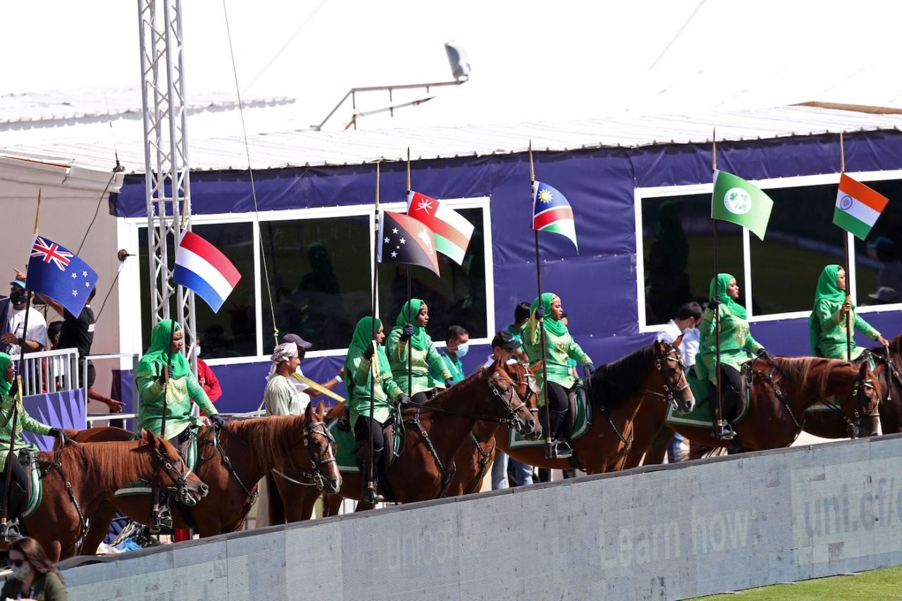 Women on horseback carry the flags of the participating nations, Oman vs Papua New Guinea, T20 World Cup, Muscat, October 17, 2021