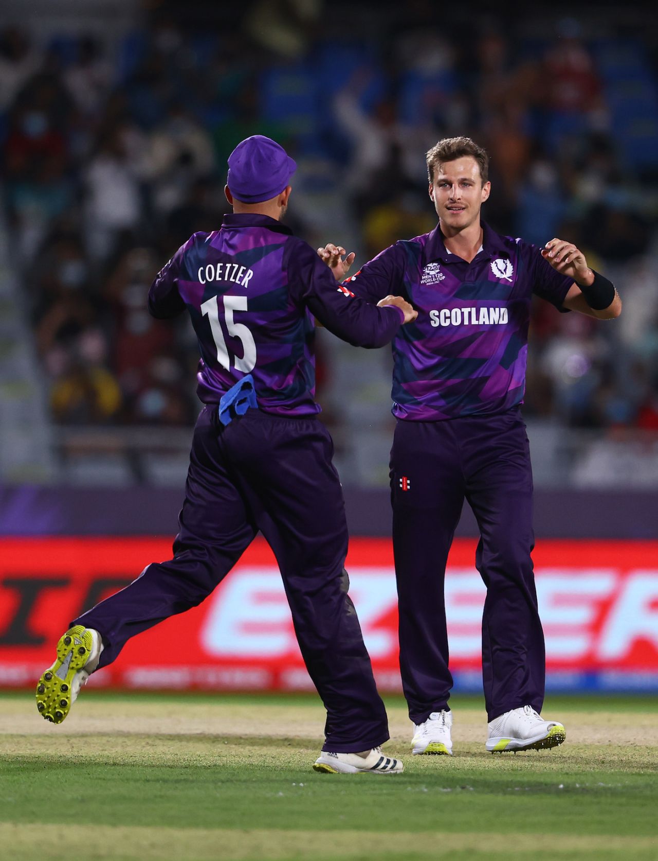 Brad Wheal celebrates a wicket with Kyle Coetzer, Bangladesh vs Scotland, T20 World Cup, Muscat, October 17, 2021