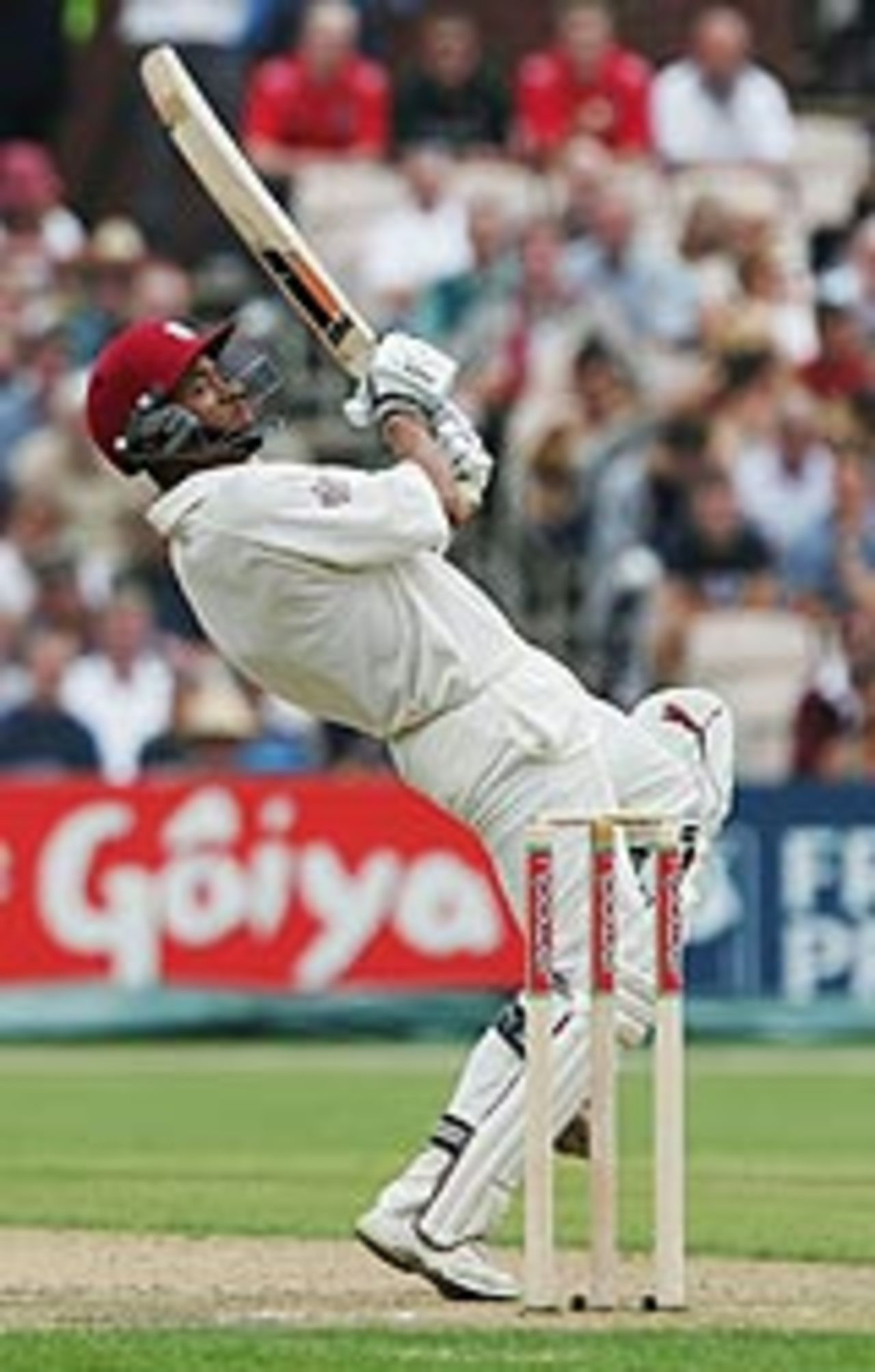 Carlton Baugh flicks Flintoff over the slips for four, as West Indies ride out a torrid morning at Old Trafford, August 14, 2004