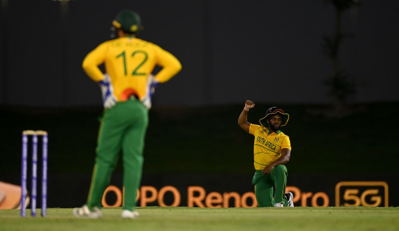 Temba Bavuma raises his fist before the start of the game, as Quinton de Kock looks on, Pakistan vs South Africa, T20 World Cup warm-up game, Abu Dhabi, October 20, 2021