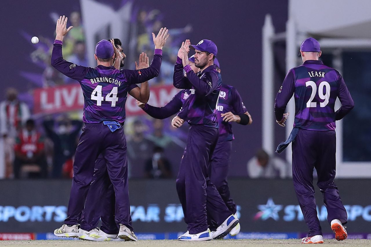 Scotland players celebrate the wicket of Kashyap Prajapati, Oman vs Scotland, T20 World Cup, Muscat, October 21, 2021