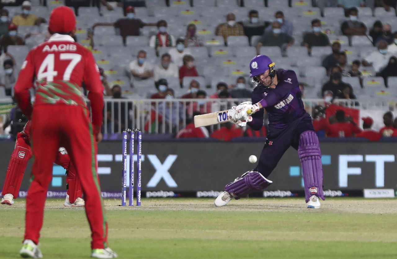 Richie Berrington goes after the ball, Oman vs Scotland, T20 World Cup 2021, Muscat, October 21, 2021