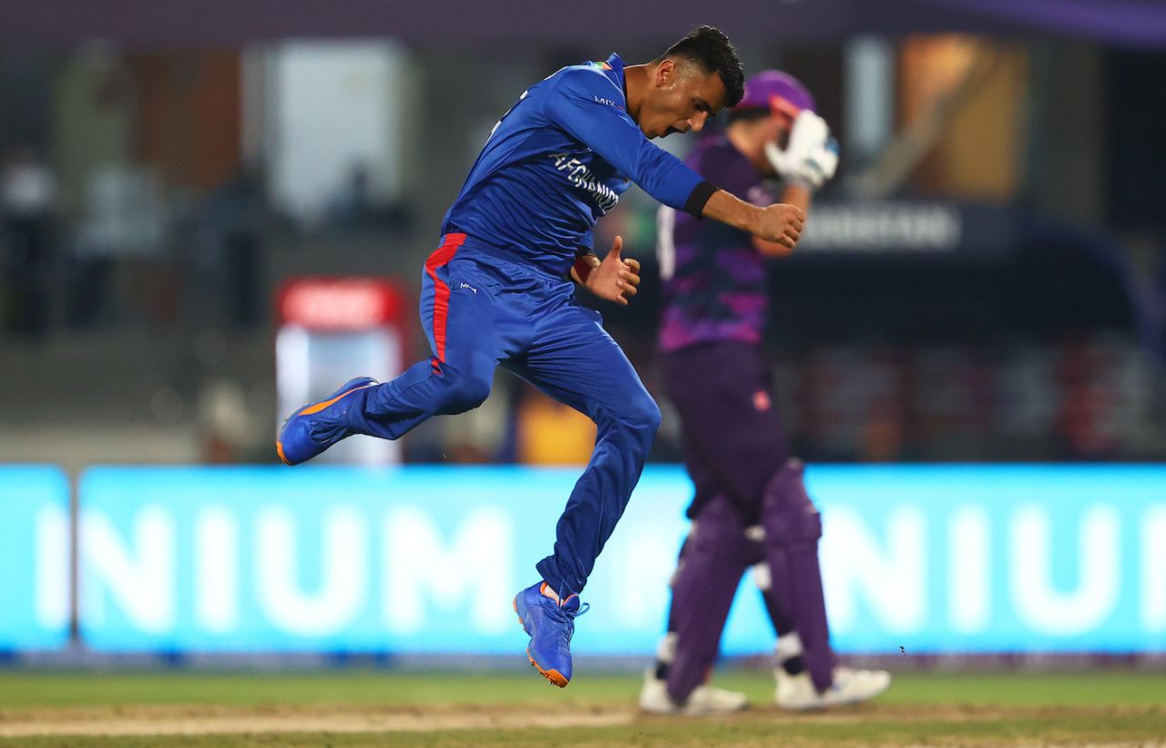 Mujeeb Ur Rahman leaps in celebration after one of his early strikes, Afghanistan vs Scotland, T20 World Cup 2021, Group 2, Sharjah, October 25, 2021