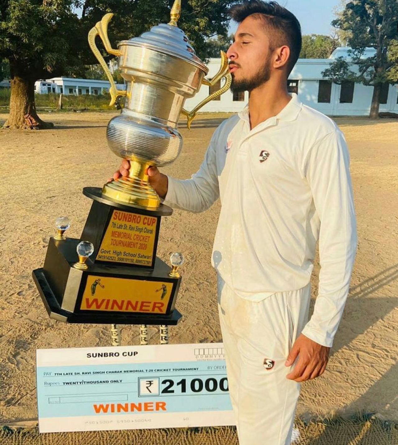Umran Malik picked up a trophy in a local cricket tournament