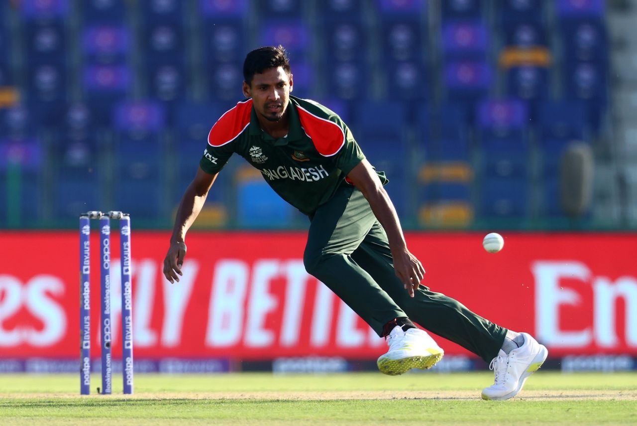 Mustafizur Rahman stops a ball off his own bowling, Bangladesh vs England, T20 World Cup, Group 1, Abu Dhabi, October 27, 2021
