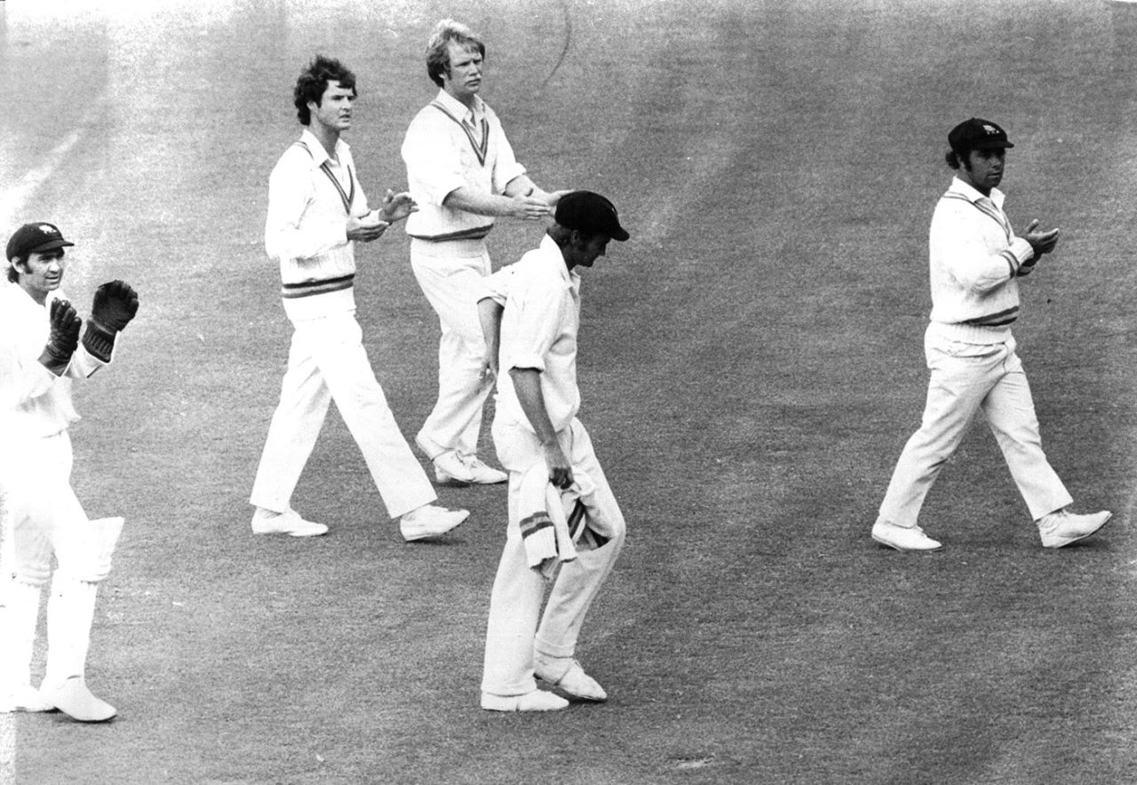 Ashley Mallett (centre) is applauded by his team-mates for his 6 for 58, New South Wales v South Australia, Sheffield Shield, 2nd day, Sydney, February 22, 1975
