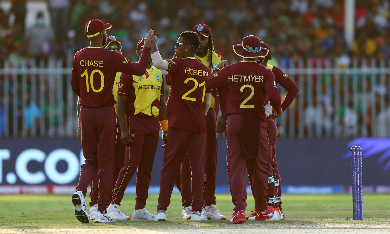 Akeal Hosein is congratulated after dismissing Soumya Sarkar, Bangladesh vs West Indies, T20 World Cup, Group 1, Sharjah, October 29, 2021