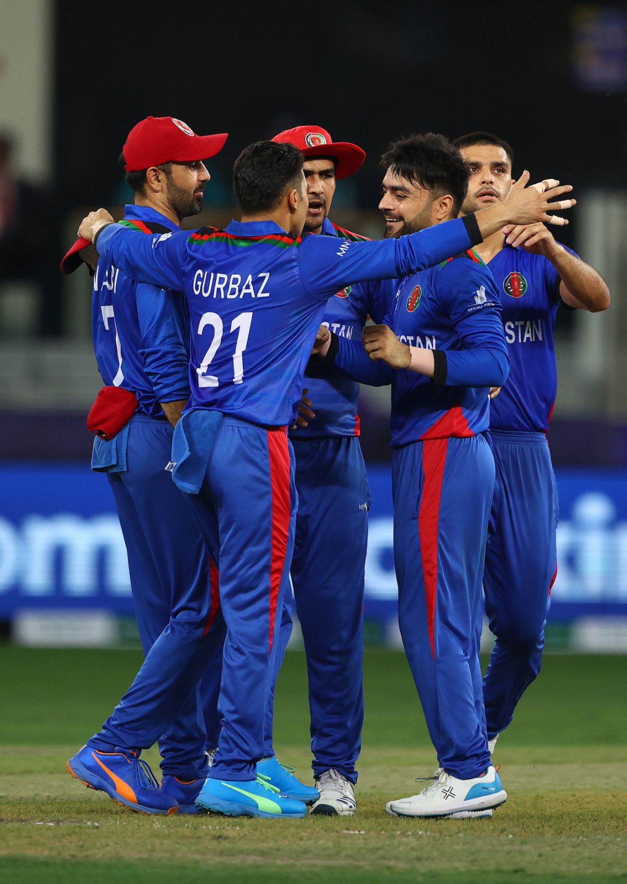 Rashid Khan is congratulated after becoming the quickest to 100 T20I wickets, Afghanistan vs Pakistan, T20 World Cup, Group 2, Dubai, October 29, 2021