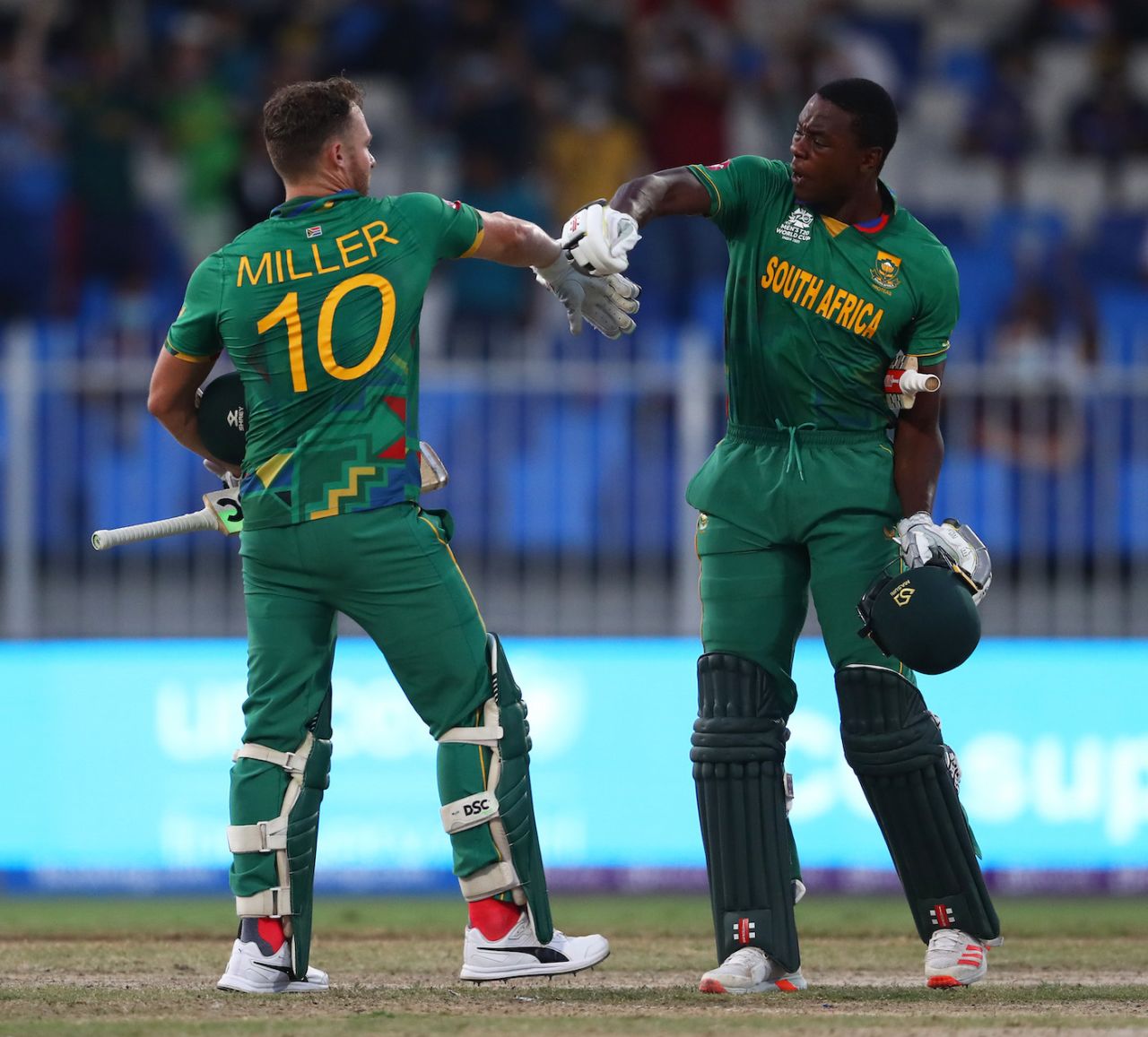 David Miller and Kagiso Rabada celebrate after the win, South Africa vs Sri Lanka, T20 World Cup, Group 1, Sharjah, October 30, 2021