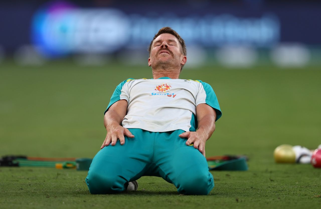 David Warner warms up before the game, Australia vs England, T20 World Cup, Group 1, Dubai, October 30, 2021