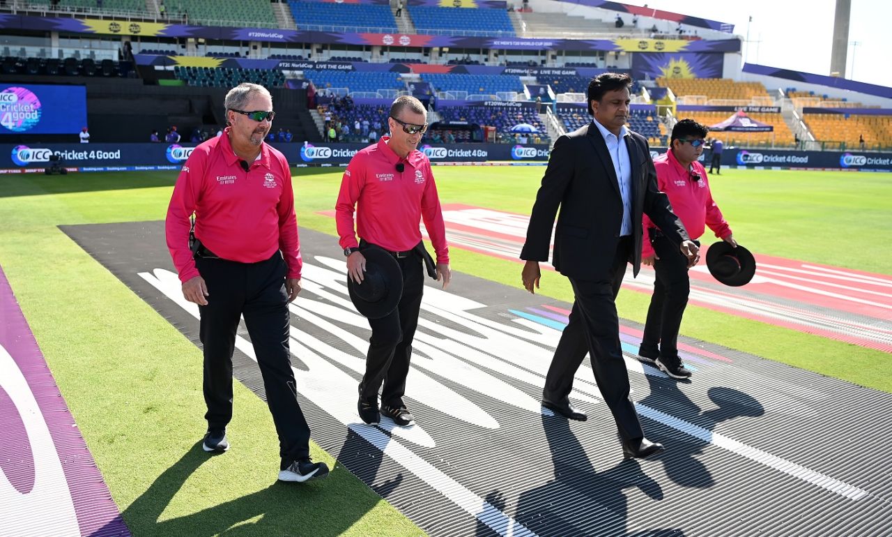 Match officials (L-R) Richard Illingworth, Chris Gaffaney, Javagal Srinath, and Ahsan Raza, march towards the pitch, Afghanistan vs Namibia, T20 World Cup, Group 2, Abu Dhabi, October 31, 2021