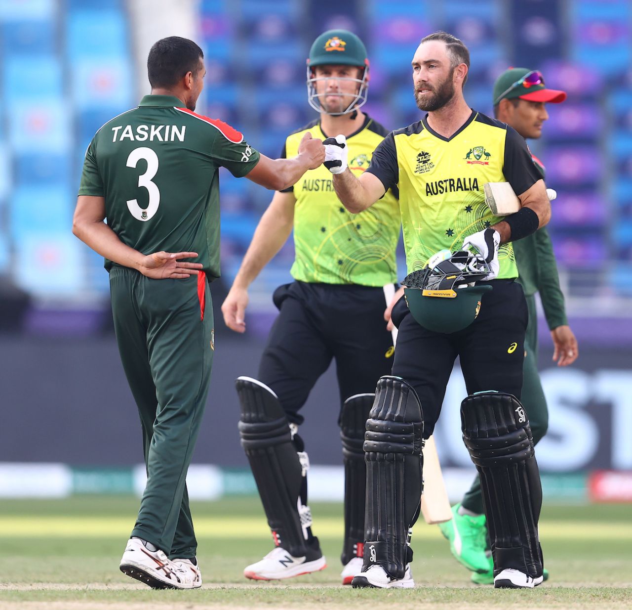 Taskin Ahmed and Glenn Maxwell bump fists after the game, Australia vs Bangladesh, T20 World Cup, Group 1, Dubai, November 4, 2021