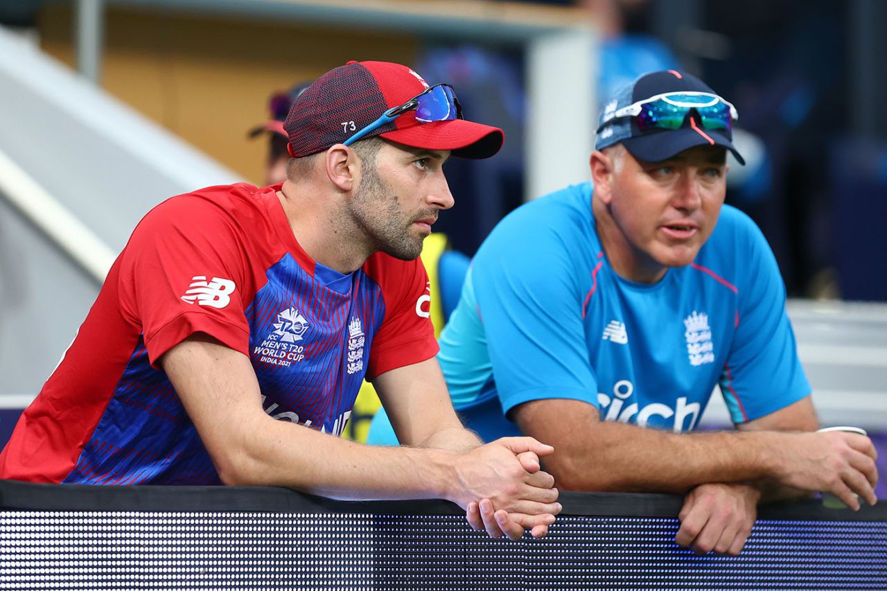 England head coach Chris Silverwood in conversation with bowler Mark Wood, ICC Men's T20 World Cup, England vs West Indies, Dubai, October 23, 2021