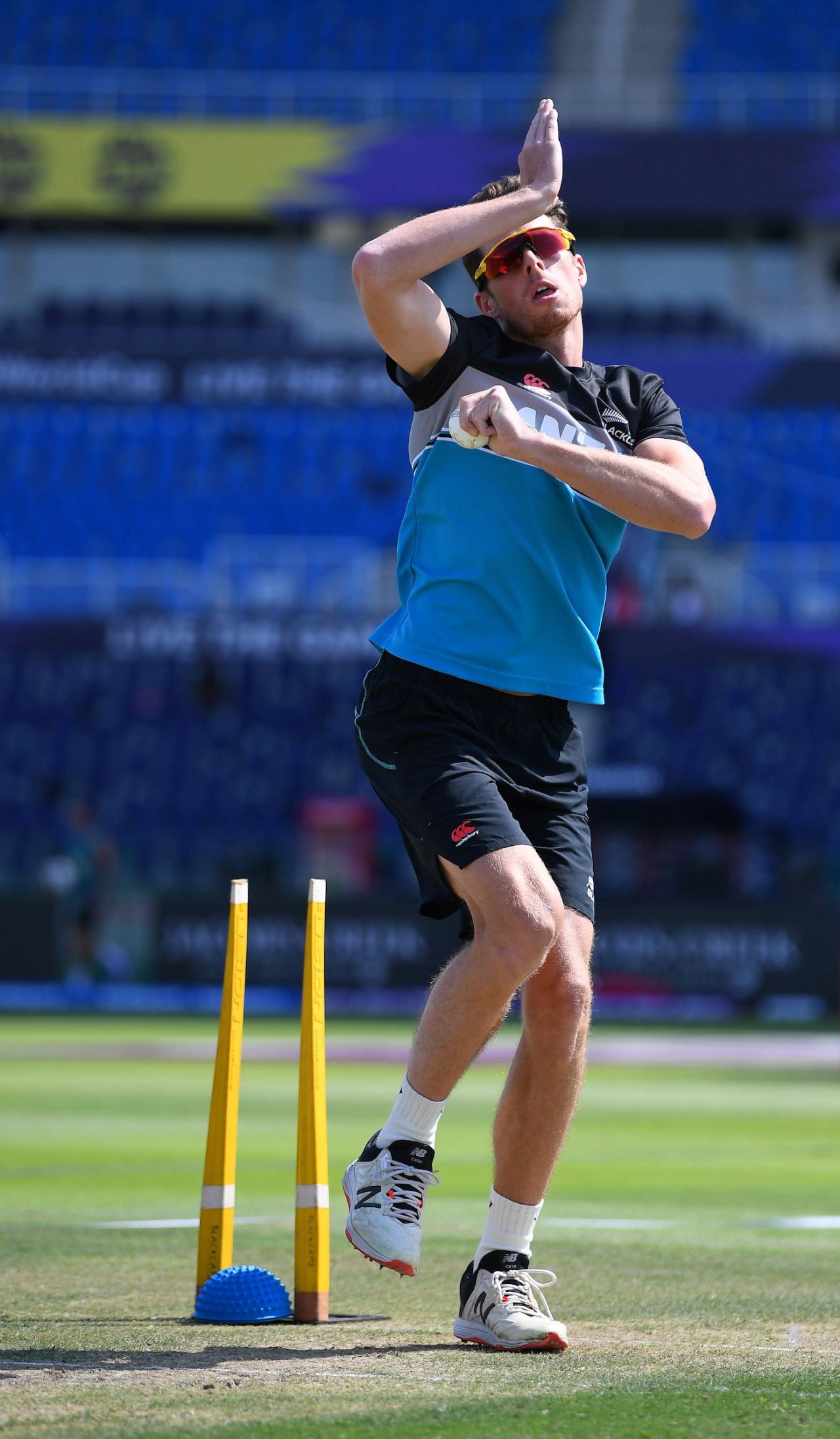 Mitchell Santner has a bowl before the start of the game, Afghanistan vs New Zealand, T20 World Cup, Group 2, Abu Dhabi, November 7, 2021
