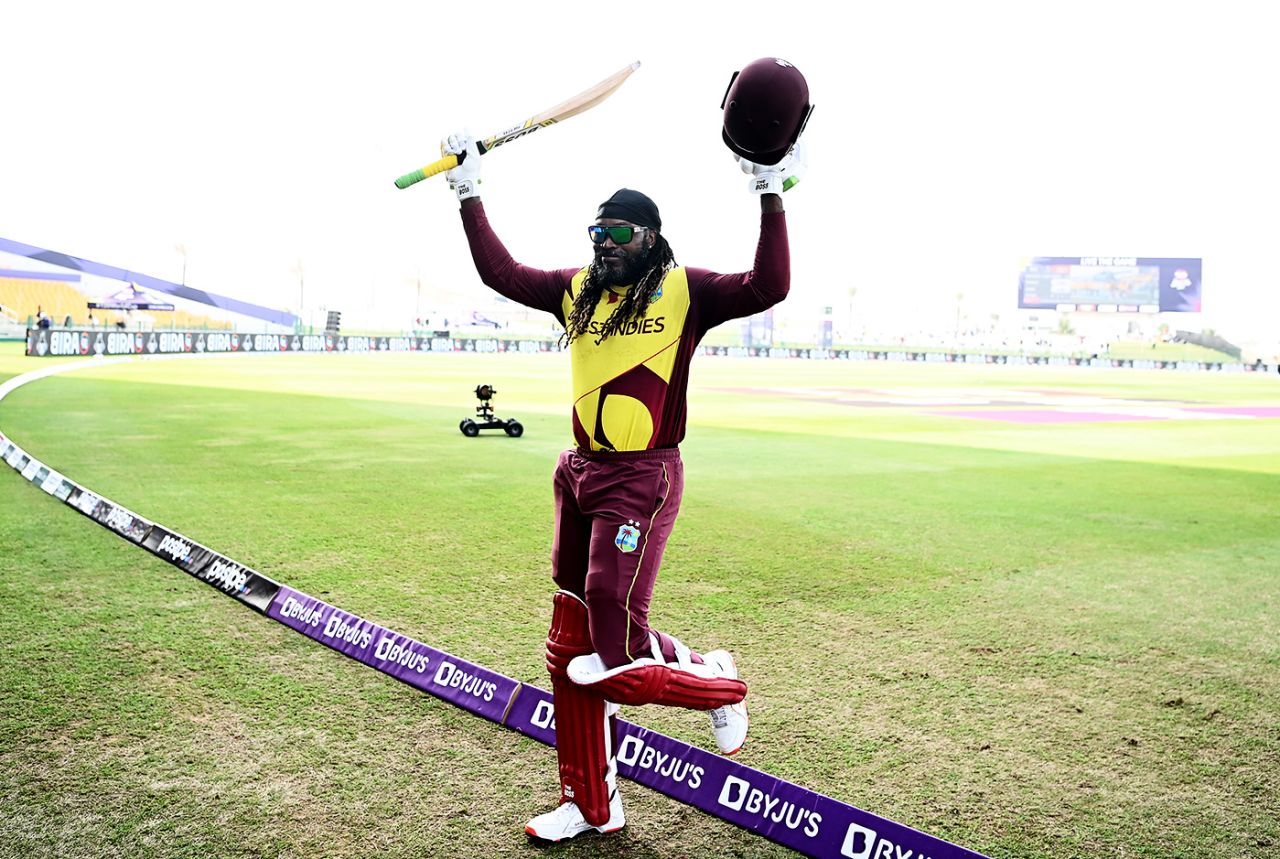 Chris Gayle raises his bat as he steps off the field, Australia vs West Indies, Men's T20 World Cup 2021, Super 12s, Abu Dhabi, November 6, 2021