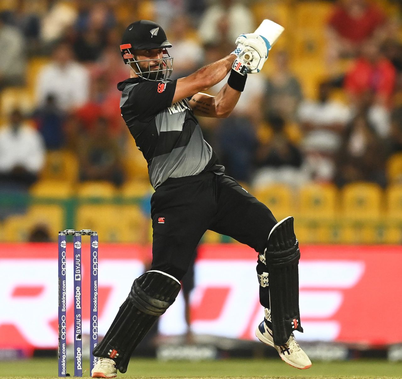Daryl Mitchell swings towards midwicket, England vs New Zealand, T20 World Cup, 1st semi-final, Abu Dhabi, November 10, 2021