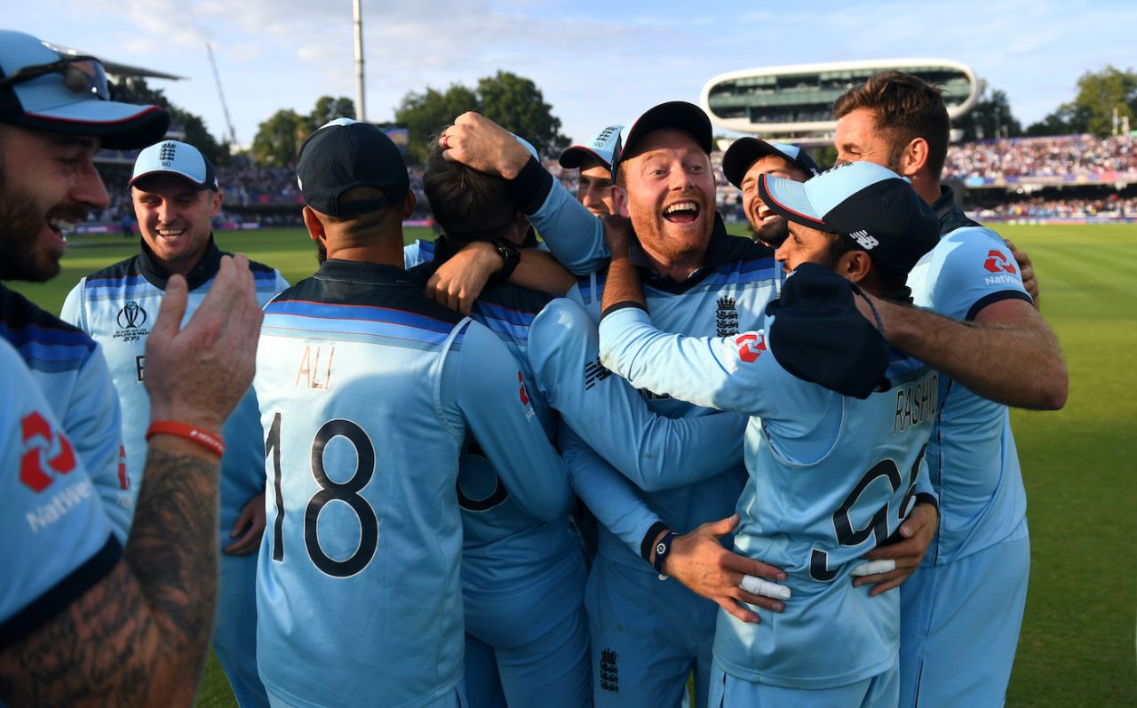 England gather for a hug after their win, England v New Zealand, World Cup final, Lord's, July 14, 2019