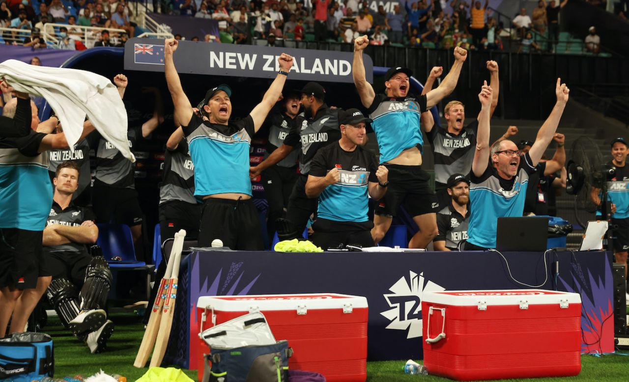 The New Zealand dugout erupts after the winning hit, England vs New Zealand, T20 World Cup, 1st semi-final, Abu Dhabi, November 10, 2021
