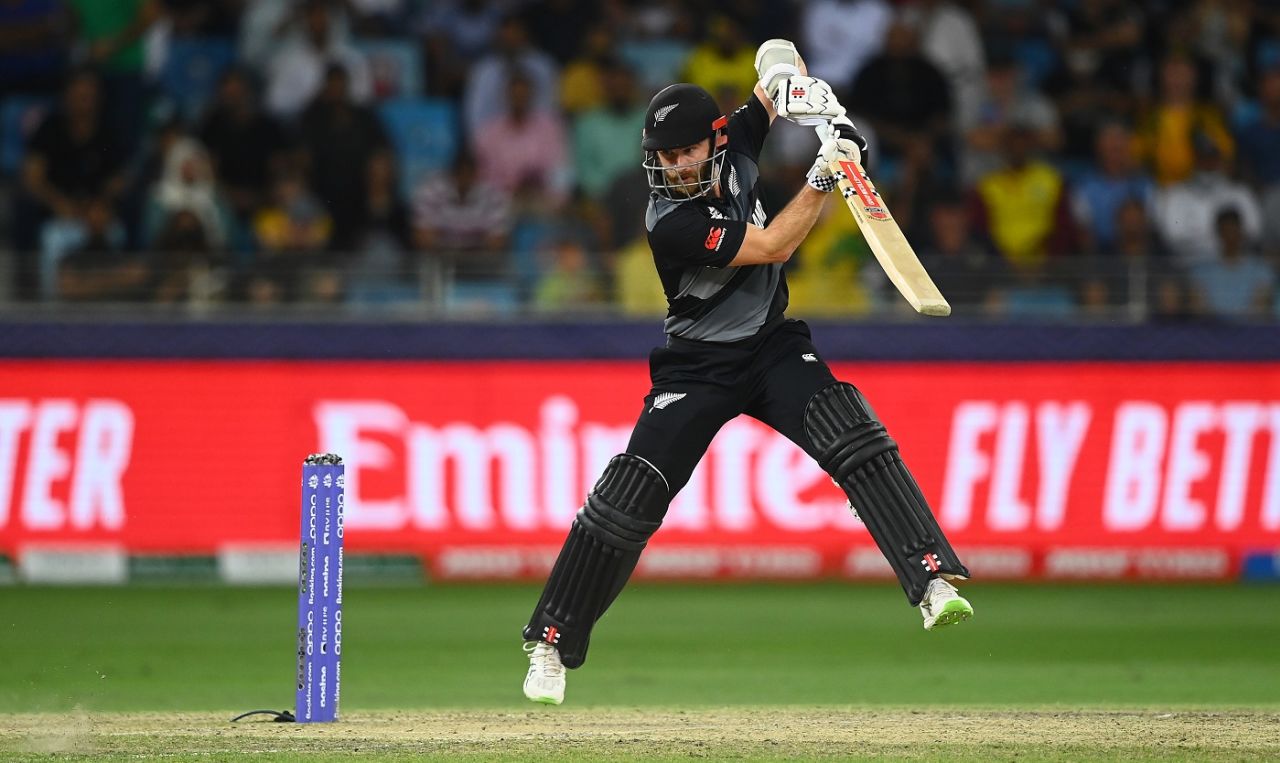 An airborne Kane Williamson punches one through the off side, Australia vs New Zealand, T20 World Cup final, Dubai, November 14, 2021