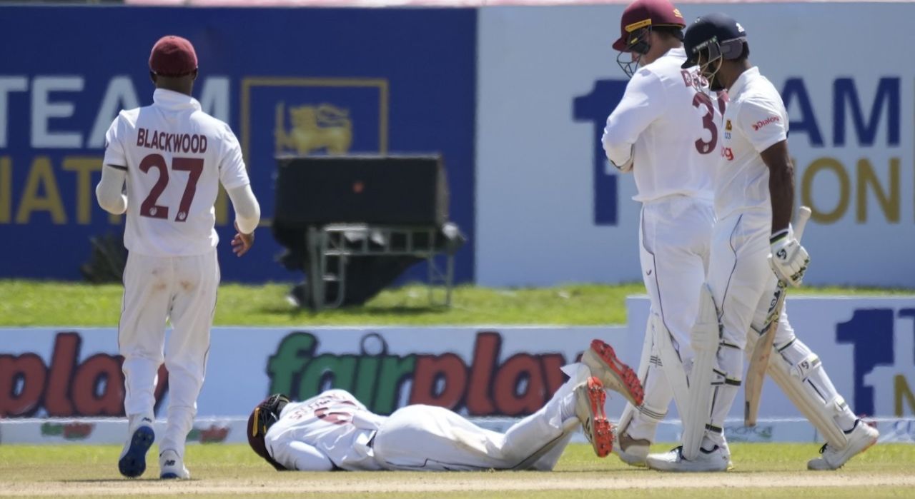 Jeremy Solozano is down on the ground after being hit on the head by a pull shot from Dimuth Karunaratne, Sri Lanka vs West Indies, 1st Test, Galle, 1st day, November 21, 2021