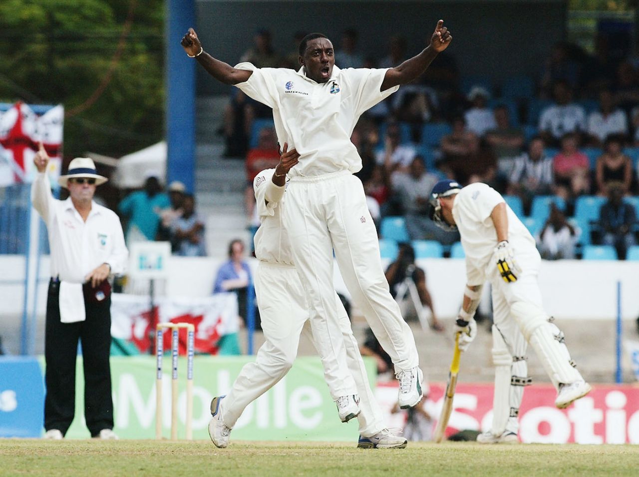 Pedro Collins celebrates Michael Vaughan's dismissal, West Indies v England, 2nd Test, Port-of-Spain, 2nd day, March 20, 2004