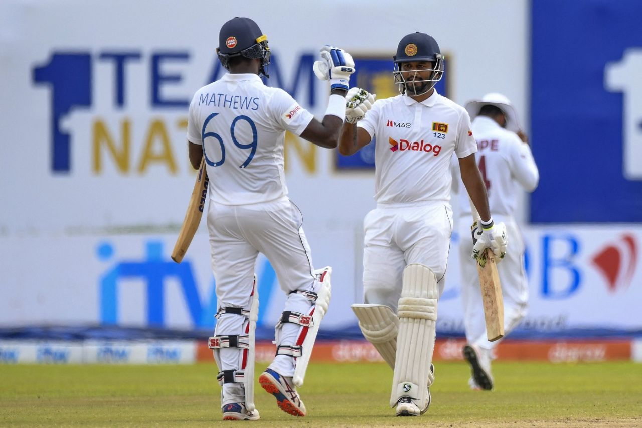 Angelo Mathews and Dimuth Karunaratne bump fists after the latter reached fifty, Sri Lanka vs West Indies, 1st Test, Galle, 4th day, November 24, 2021