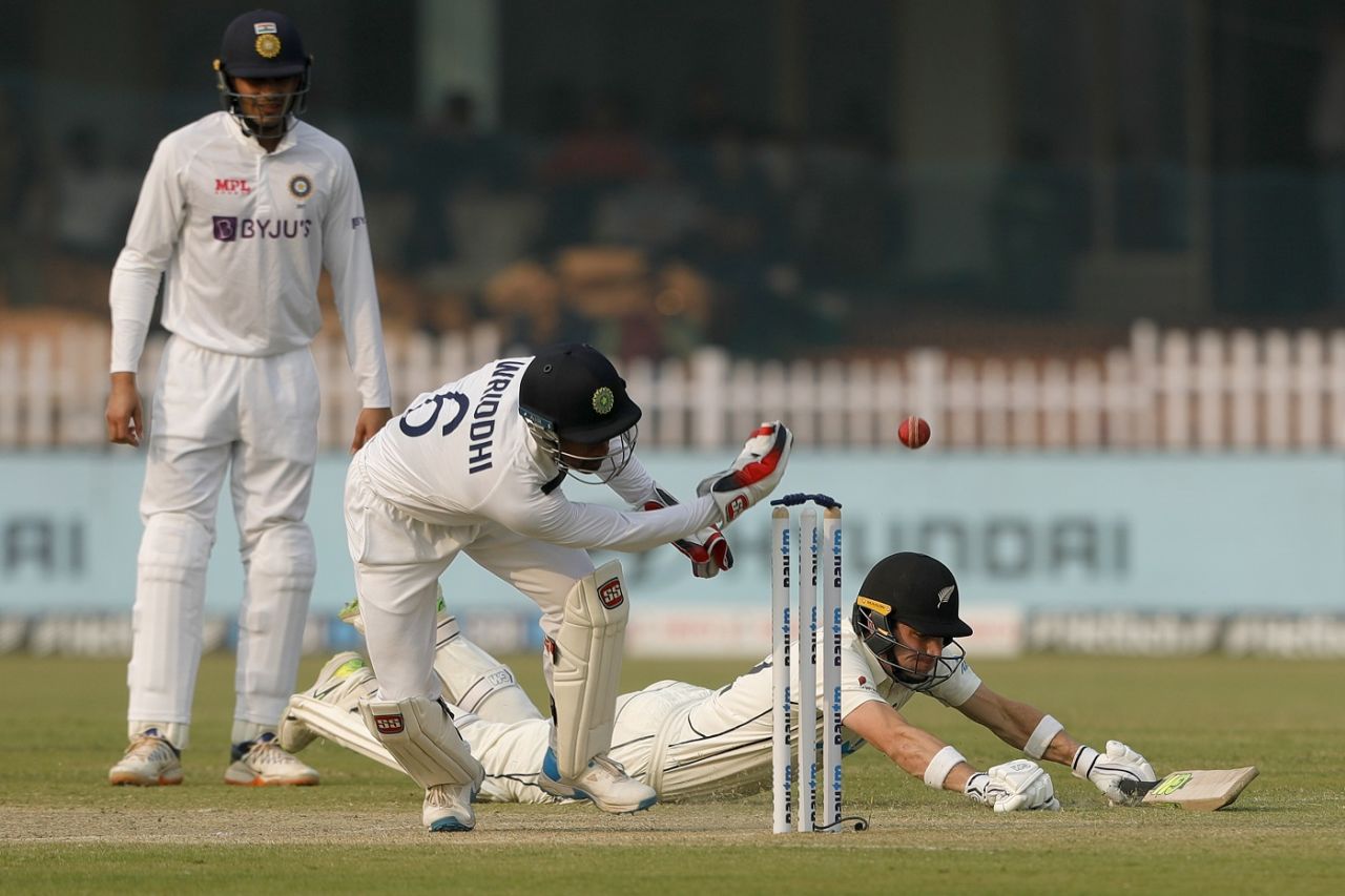Wriddhiman Saha tries to run Will Young out, but the batter is well in, India v New Zealand, 1st Test, Kanpur, 2nd day, November 26, 2021
