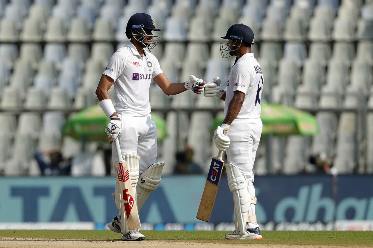 Axar Patel and Mayank Agarwal bump fists during their partnership, India vs New Zealand, 2nd Test, Wankhede, 2nd day, December 4, 2021