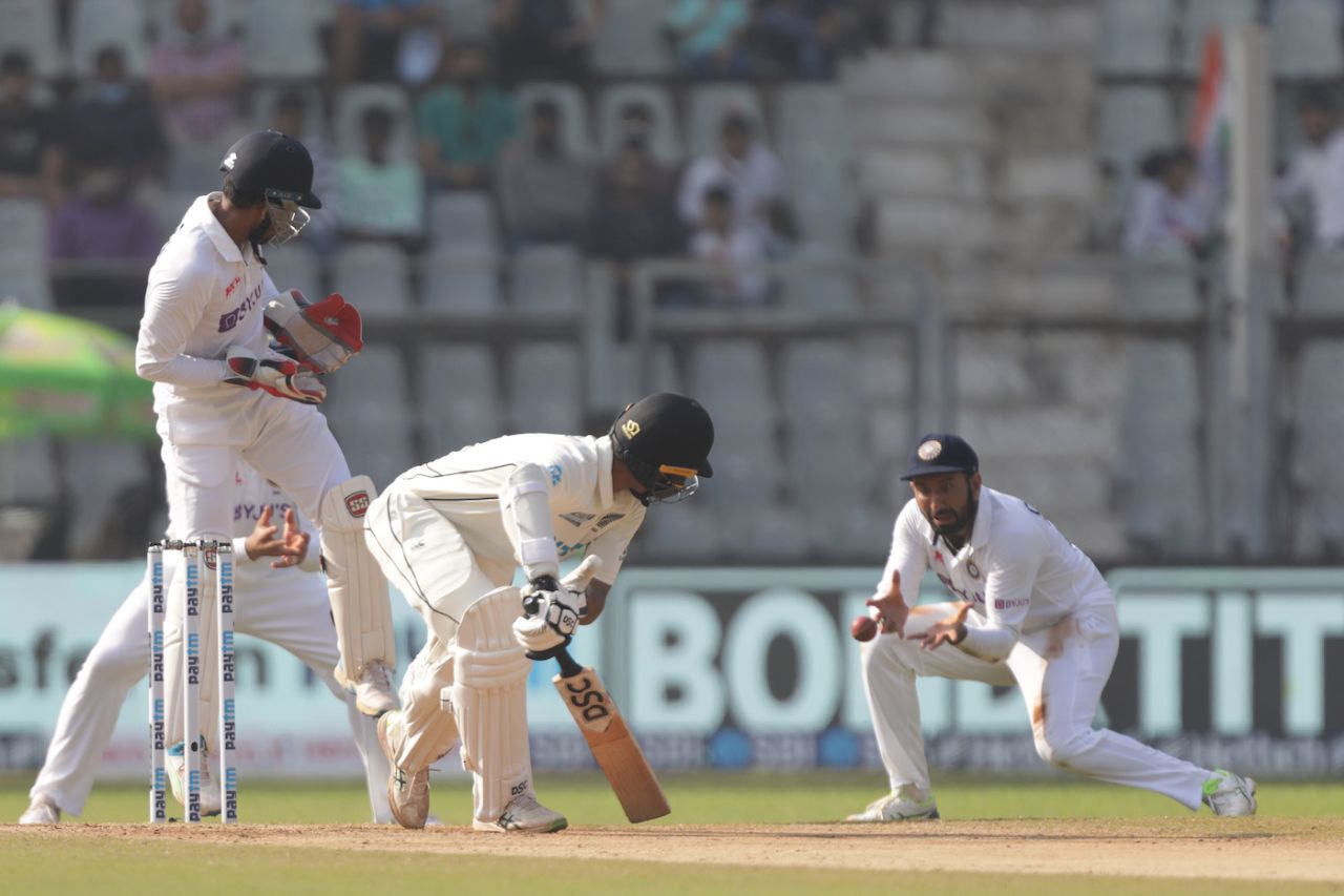 Cheteshwar Pujara gets in position to take Rachin Ravindra's catch, India vs New Zealand, 2nd Test, Mumbai,. 4th day, December 6, 2021