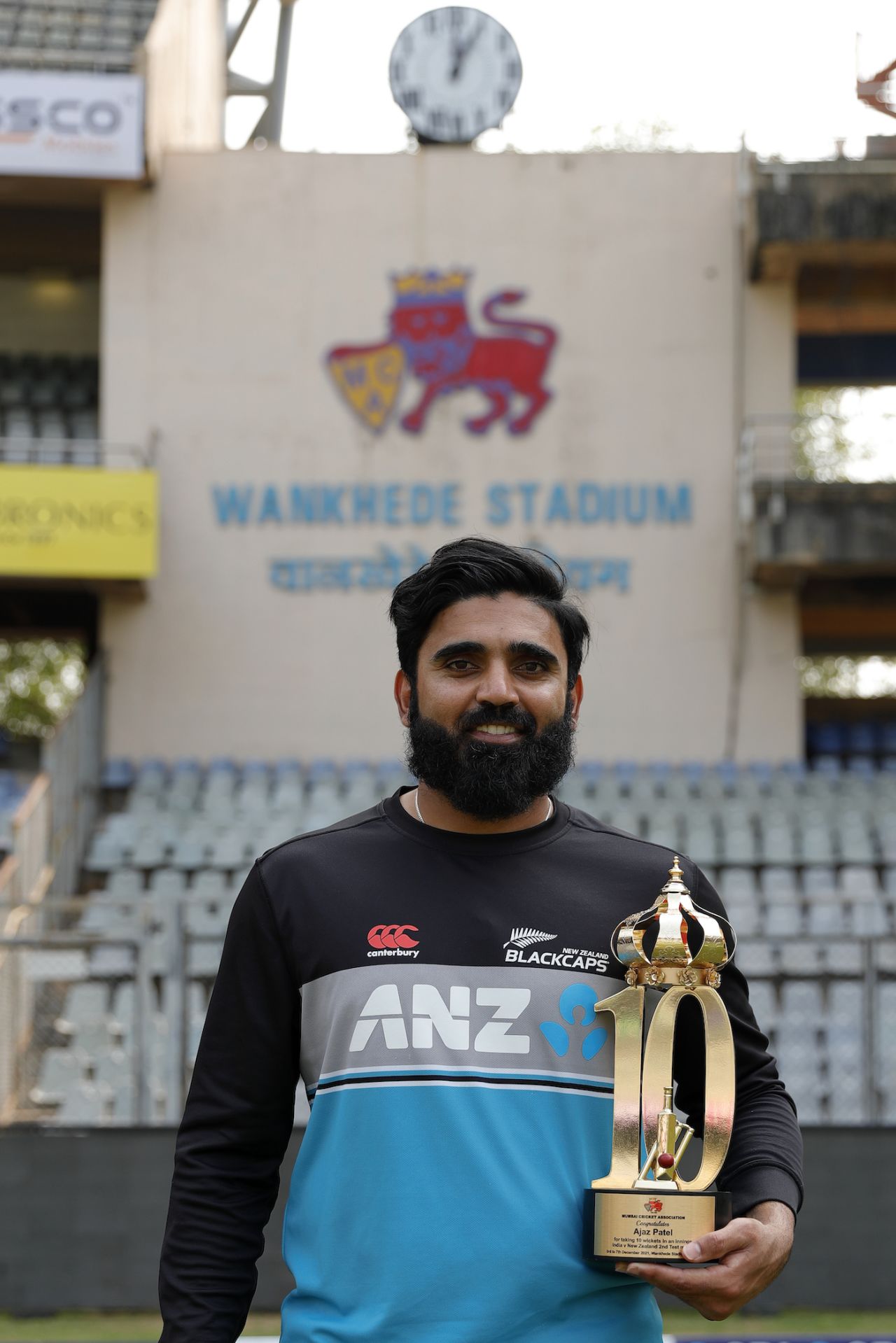 Ajaz Patel poses with his special trophy, awarded for achieving the Perfect Ten, India vs New Zealand, 2nd Test, Mumbai, 4th day, December 6, 2021