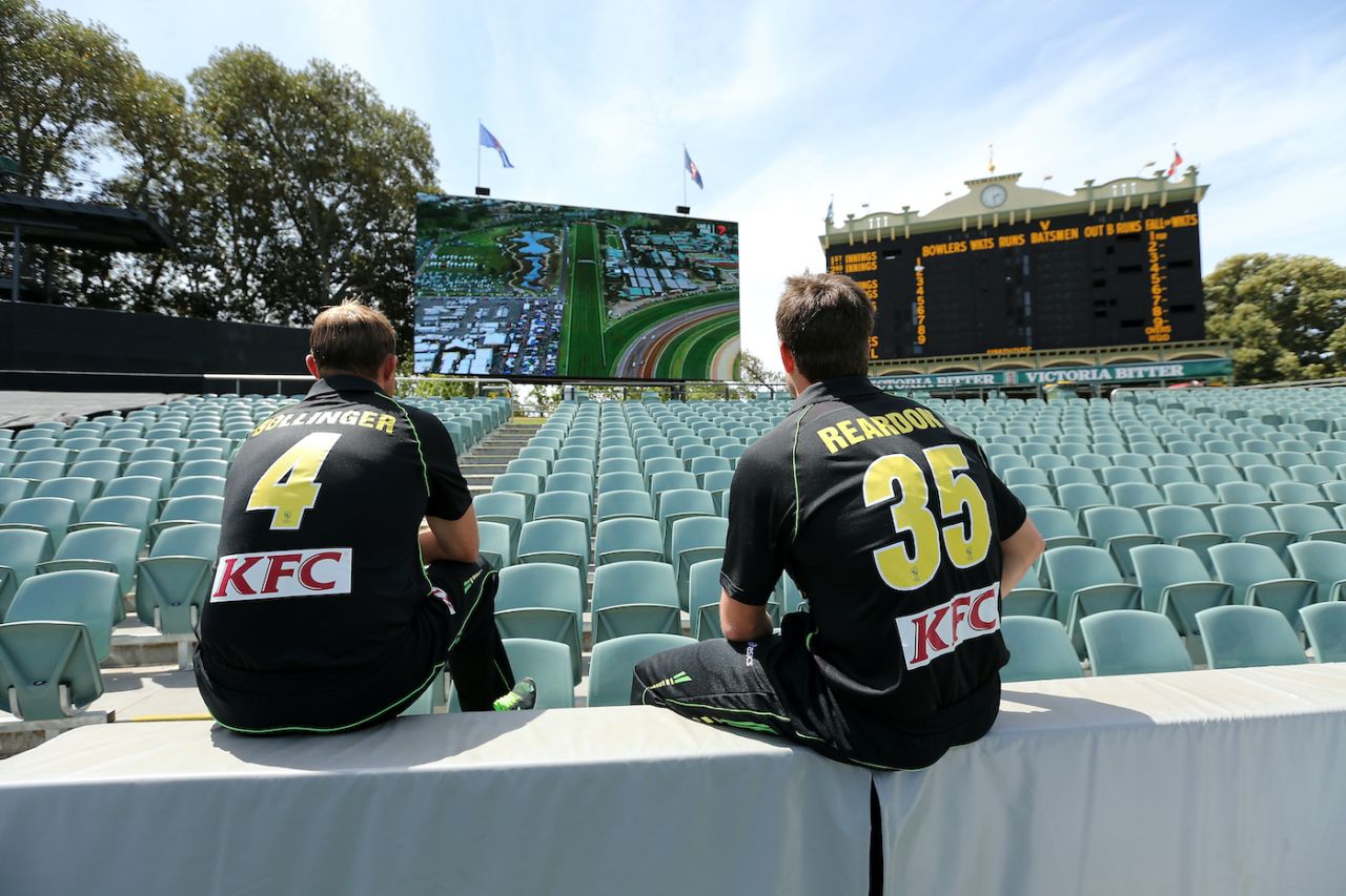 Doug Bollinger and Nathan Reardon watch the Melbourne Cup horse race, South Africa tour of Australia, Adelaide Oval, November 4, 2014 