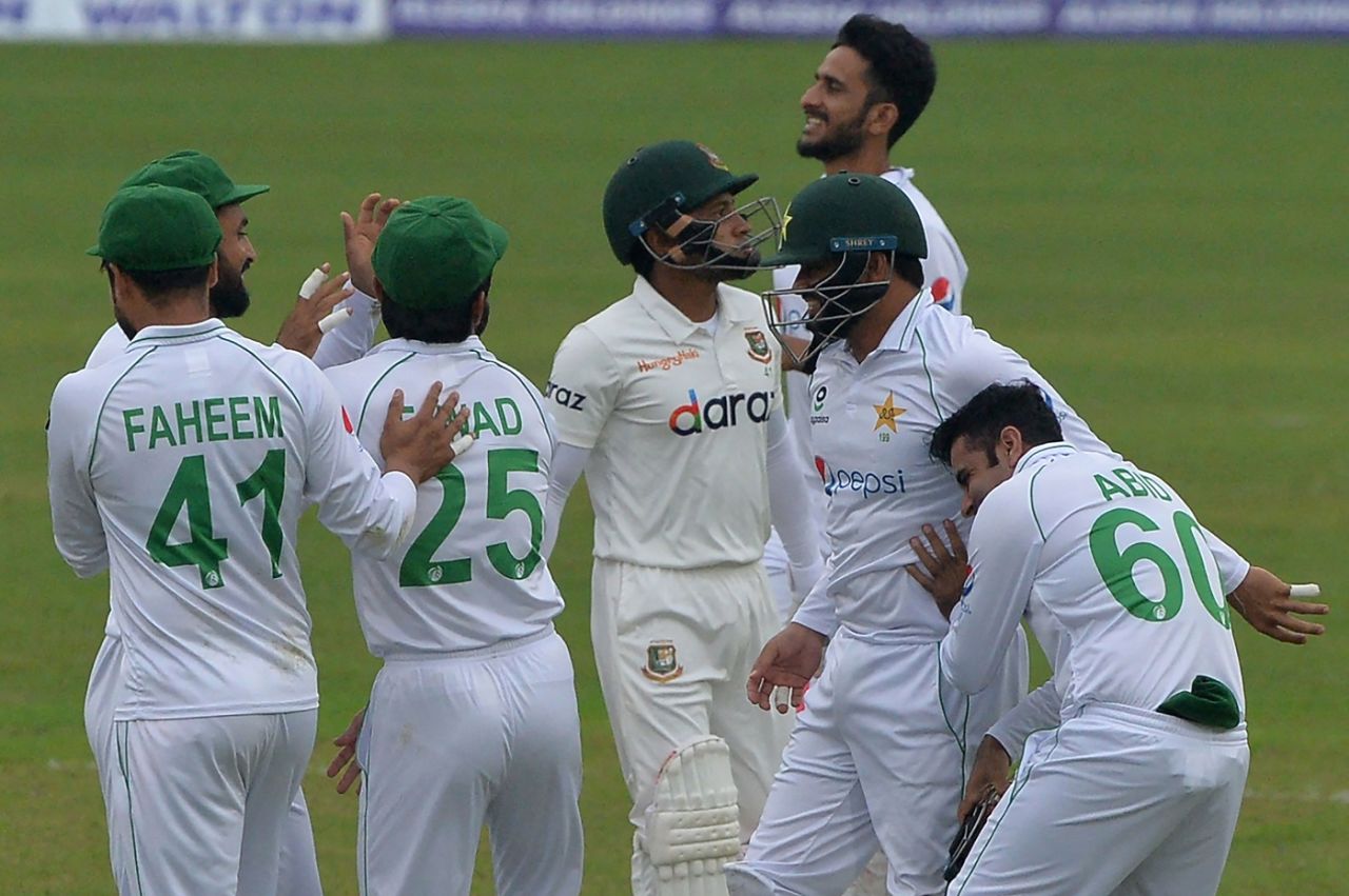 Mushfiqur Rahim walks away as the Pakistan players celebrate, Bangladesh vs Pakistan, 2nd Test, 4th day, Dhaka, December 7, 2021