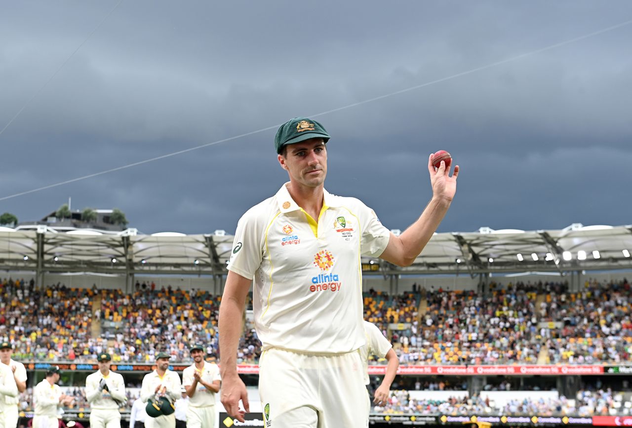 Pat Cummins holds the ball aloft after claiming his first Ashes five-for, Australia vs England, The Ashes, 1st Test, Day 1, The Gabba, Brisbane, December 8, 2021
