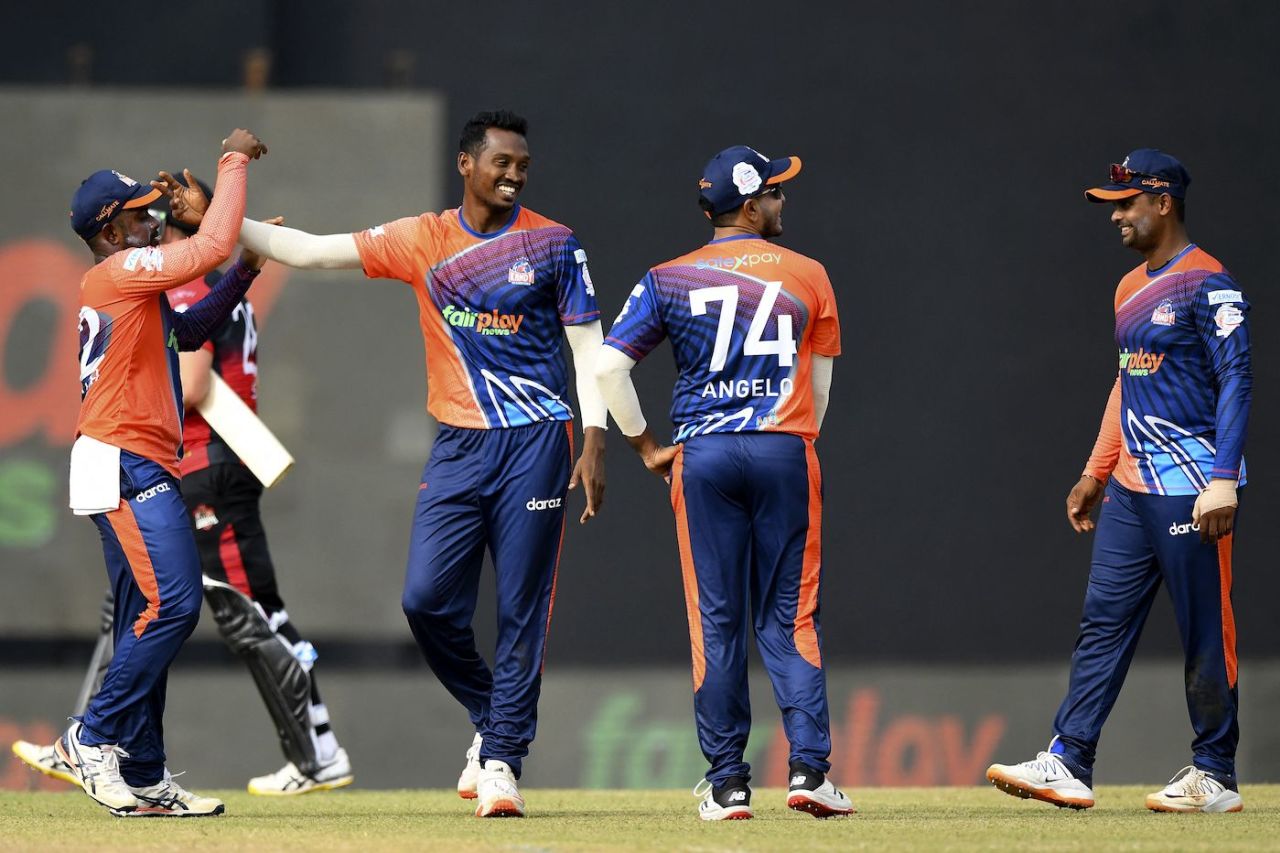 Kandy Warriors Al-Amin Hossain celebrates with team-mates, Colombo, December 6, 2021