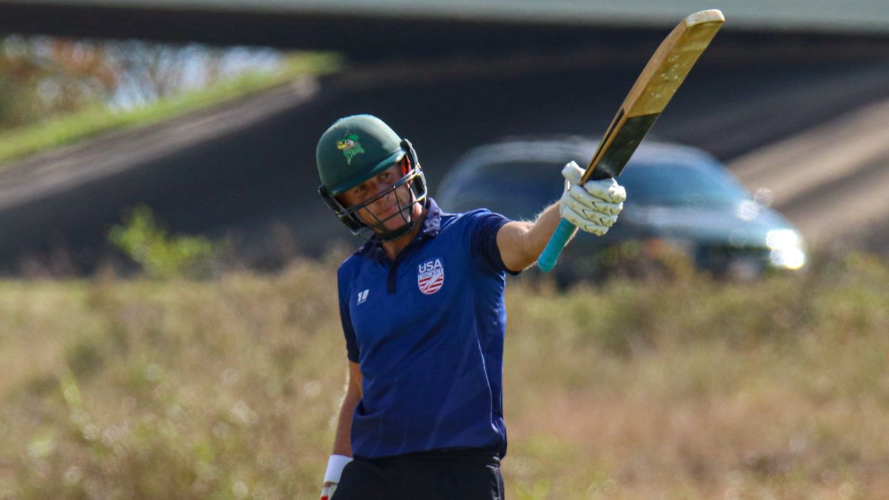 Marty Kain raises his bat after reaching a half-century, 2021 USA Cricket Men's 50-over National Championships, Prairie View, November 16, 2021
