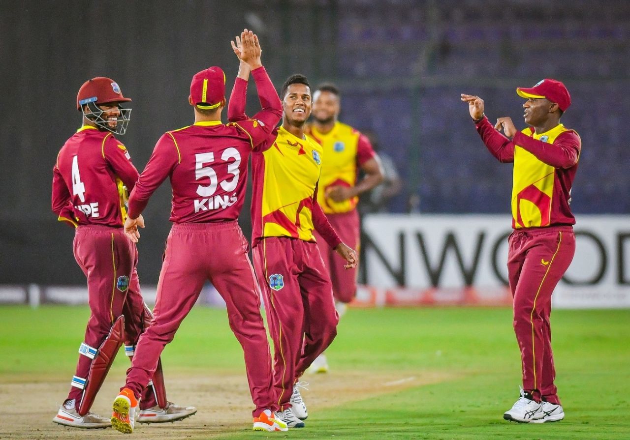 Akeal Hosein celebrates his first wicket of the match, Pakistan v West Indies, 1st T20I, Karachi, December 13, 2021