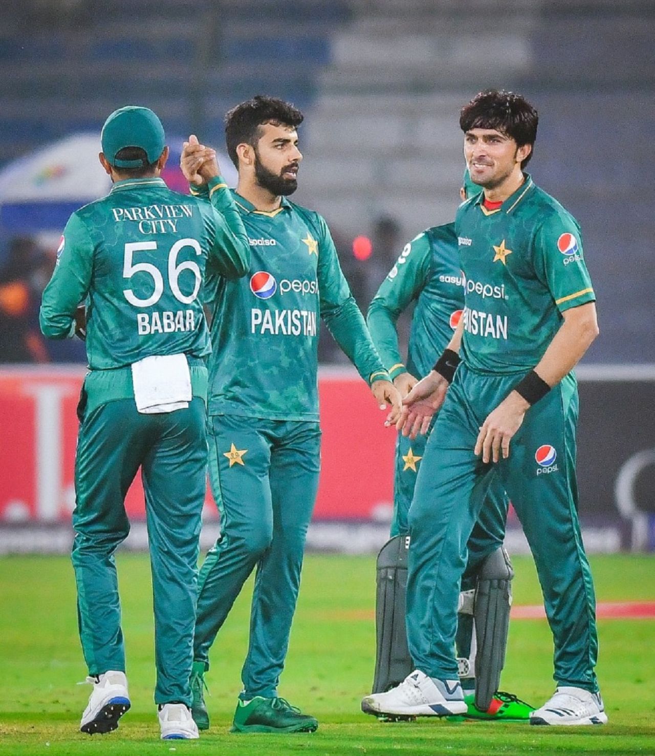 Babar Azam, Shadab Khan and Mohammad Wasim celebrate a wicket, Pakistan v West Indies, 1st T20I, Karachi, December 13, 2021