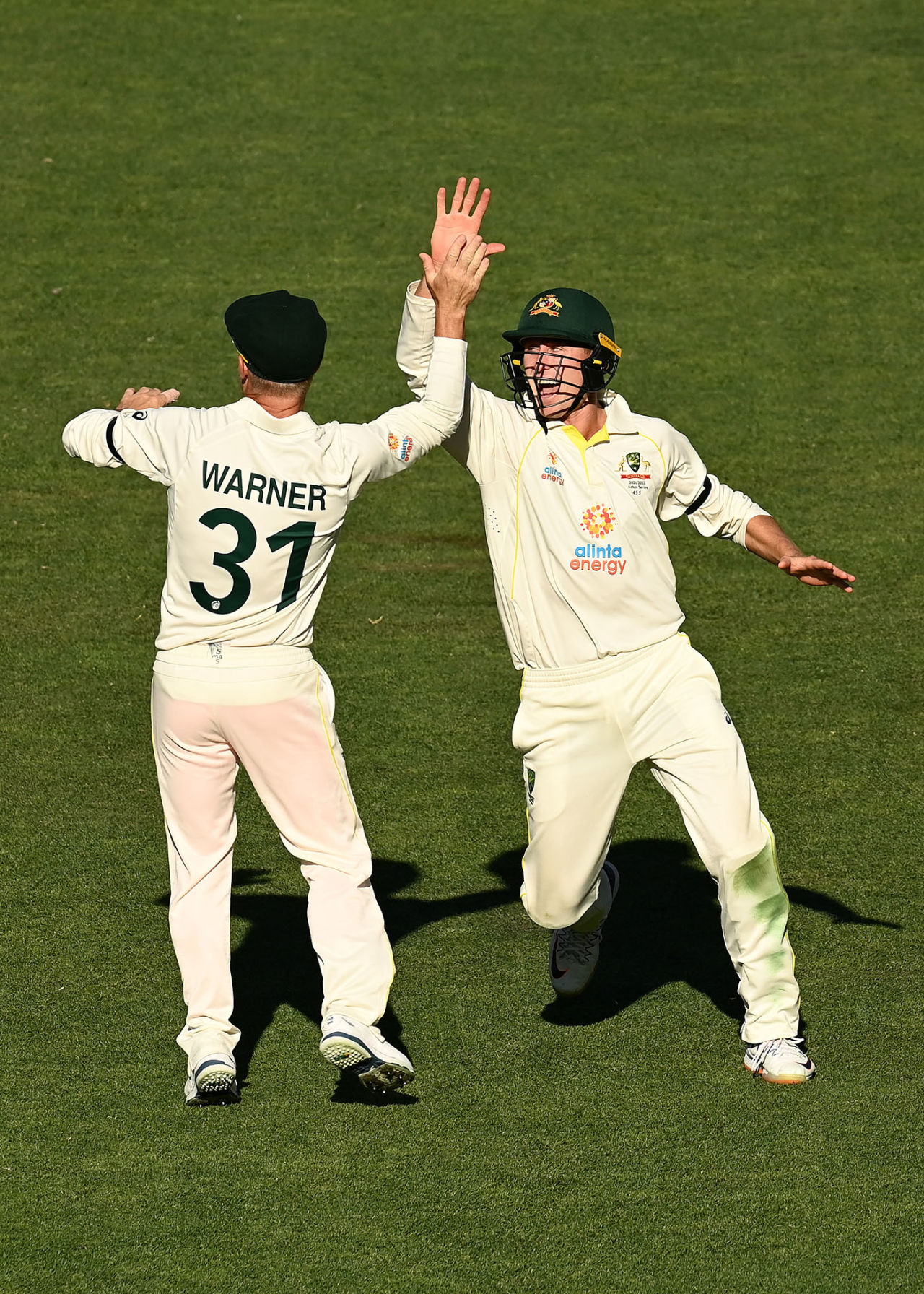 Marnus Labuschagne celebrates with David Warner after taking a catch to dismiss Ollie Pope, Australia vs England, 2nd Test, The Ashes, Adelaide, 3rd day, December 18, 2021