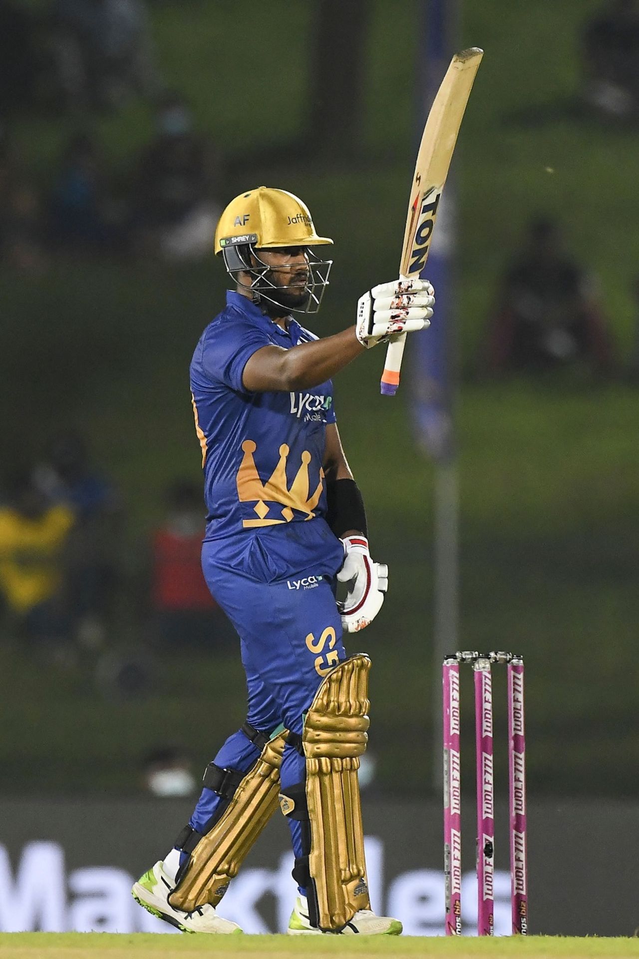 Avishka Fernando raises his bat after scoring a half-century, Jaffna Kings vs Dambulla Giants, LPL 2021, Hambantota, December 21, 2021