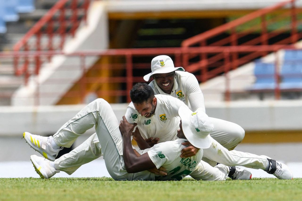 Kagiso Rabada, Keshav Maharaj and Lungi Ngidi celebrate the dismissal of Joshua de Silva, Gros Islet, 4th day, June 21, 2021