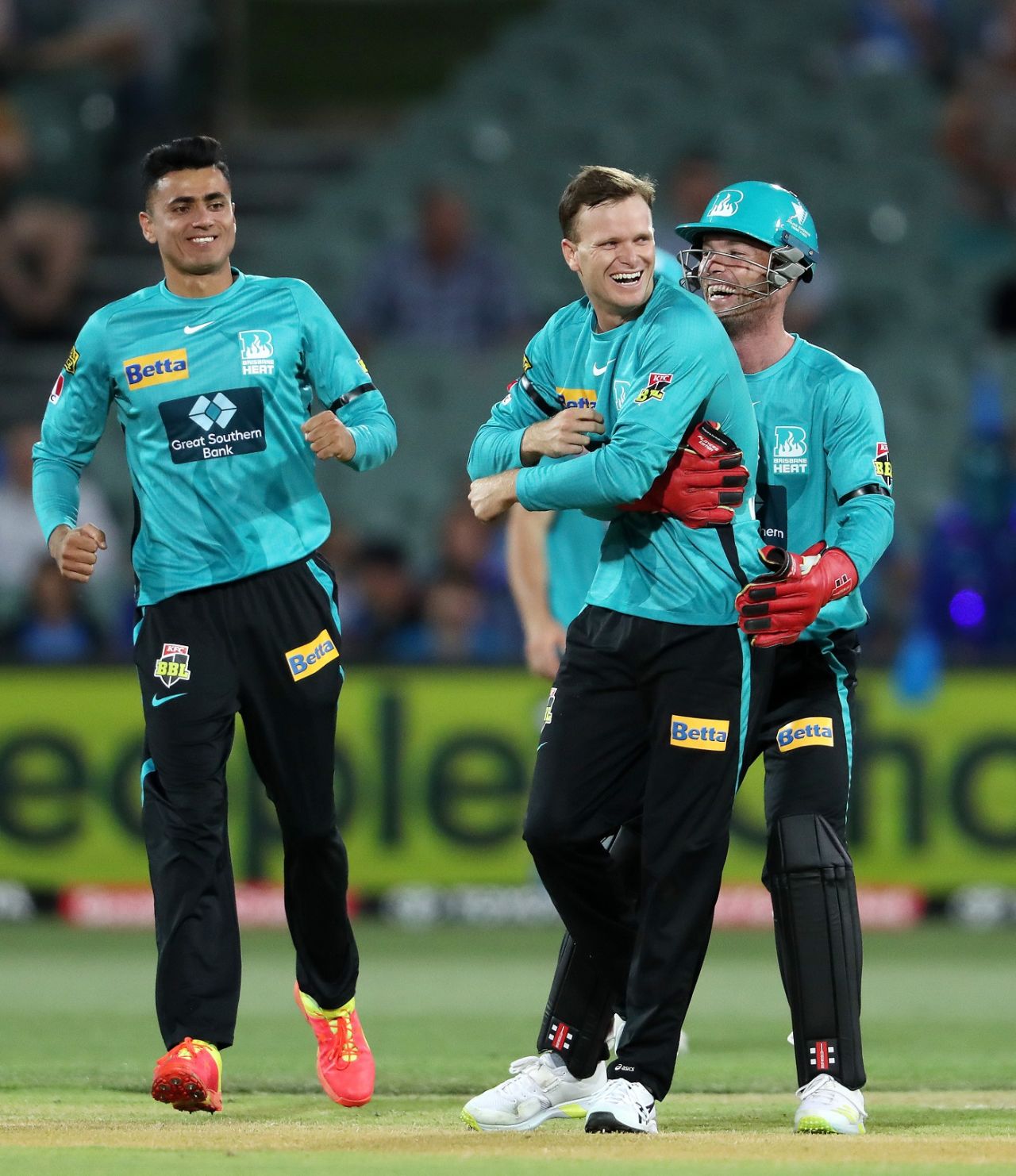 Jimmy Peirson embraces Matt Kuhnemann after he claimed the wicket of George Garton, Adelaide Strikers vs Brisbane Heat, BBL 2021, December 23, 2021, Adelaide