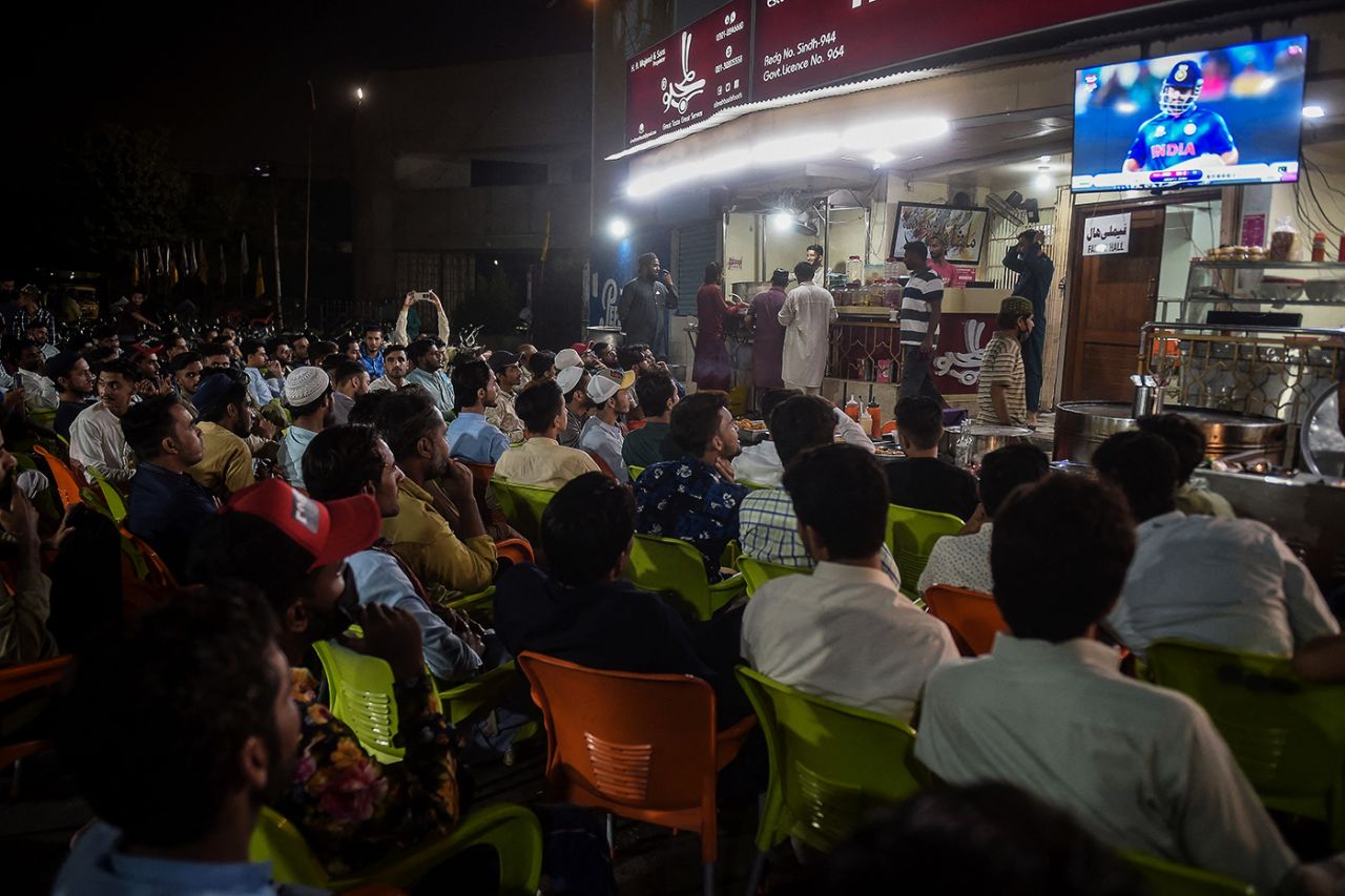 Fans in Karachi watch the India-Pakistan match on a television set up outside a restaurant, India vs Pakistan, Men's T20 World Cup 2021, Super 12s, Dubai, October 24, 2021