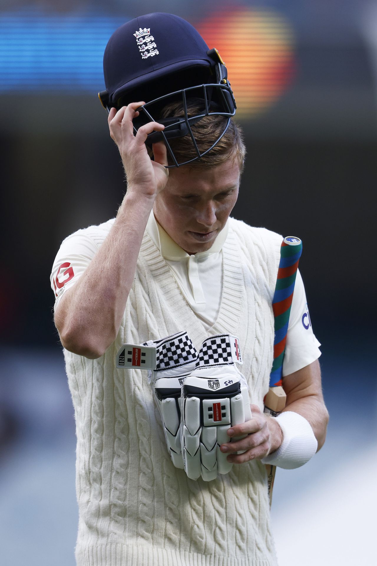 Zak Crawley leaves the field after being dismissed by Mitchell Starc, Melbourne, December 27, 2021