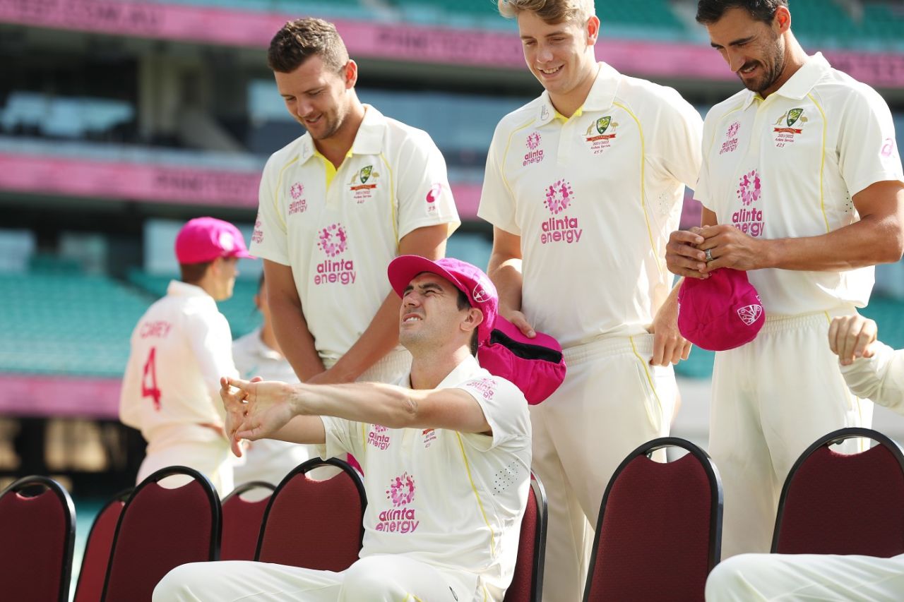Pat Cummins relaxes ahead of a team photo at the SCG