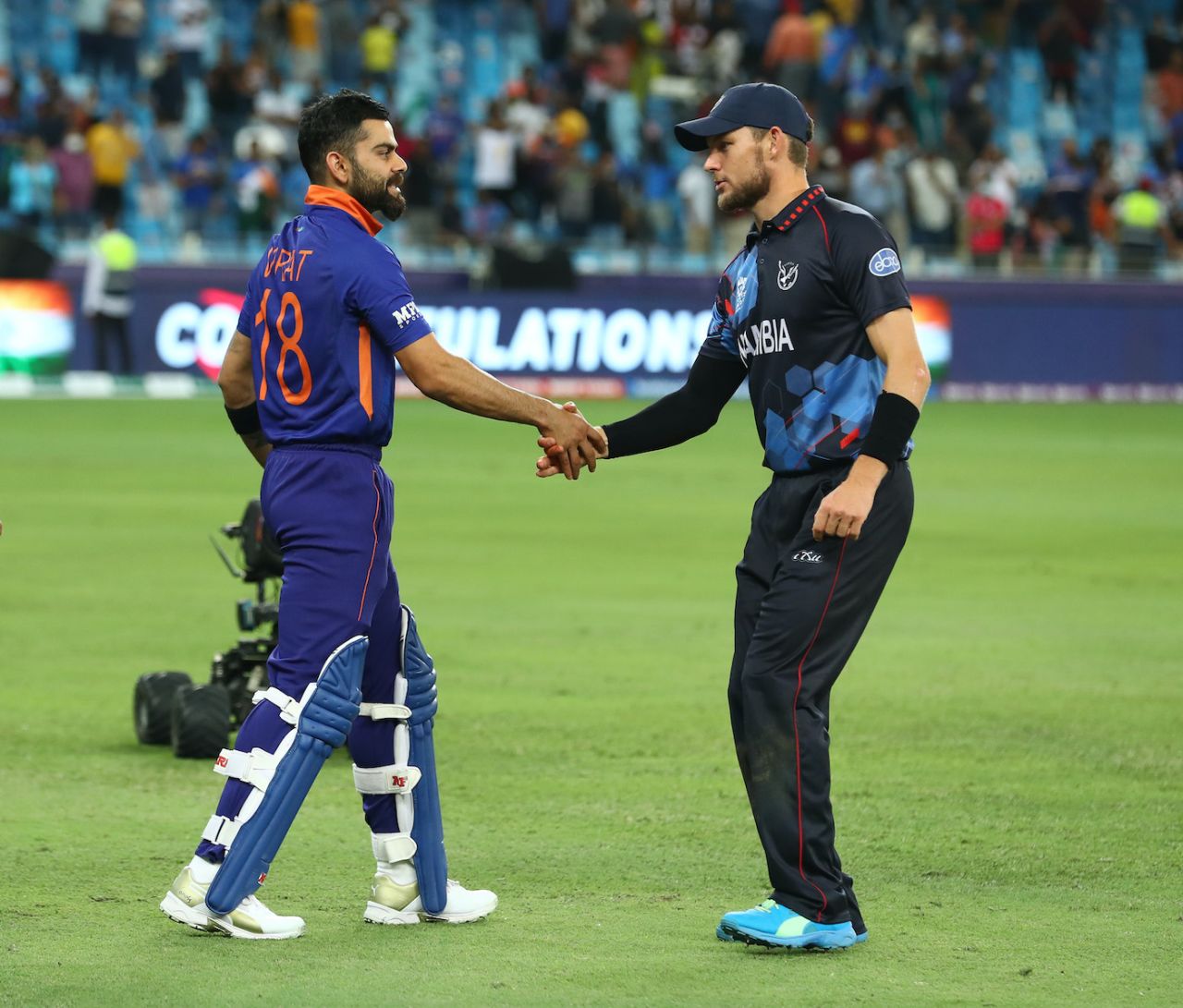 Gerhard Erasmus and Virat Kohli congratulate each other after the match, India vs Namibia, T20 World Cup, Group 2, Dubai, November 8, 2021