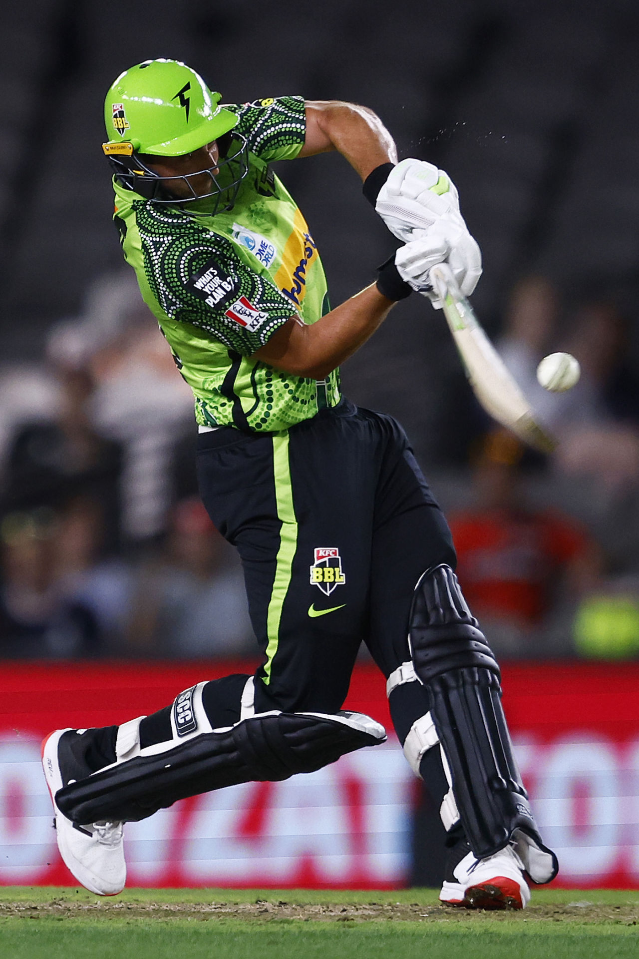 Daniel Sams goes down the ground, baseball style, Melbourne Renegades vs Sydney Thunder, BBL 2021-22, Melbourne, January 8, 2022