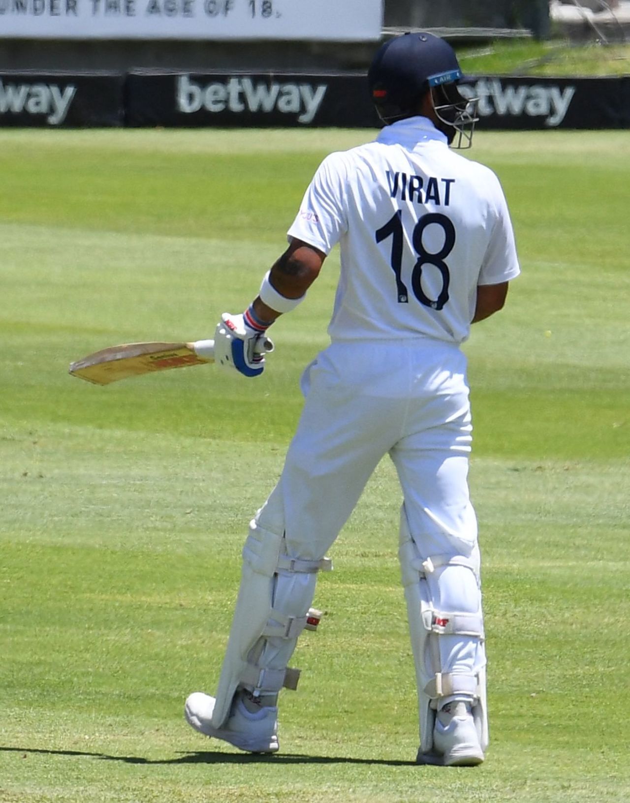 Virat Kohli walks back after his dismissal on the third day of the third Test, Cape Town, January 13, 2022