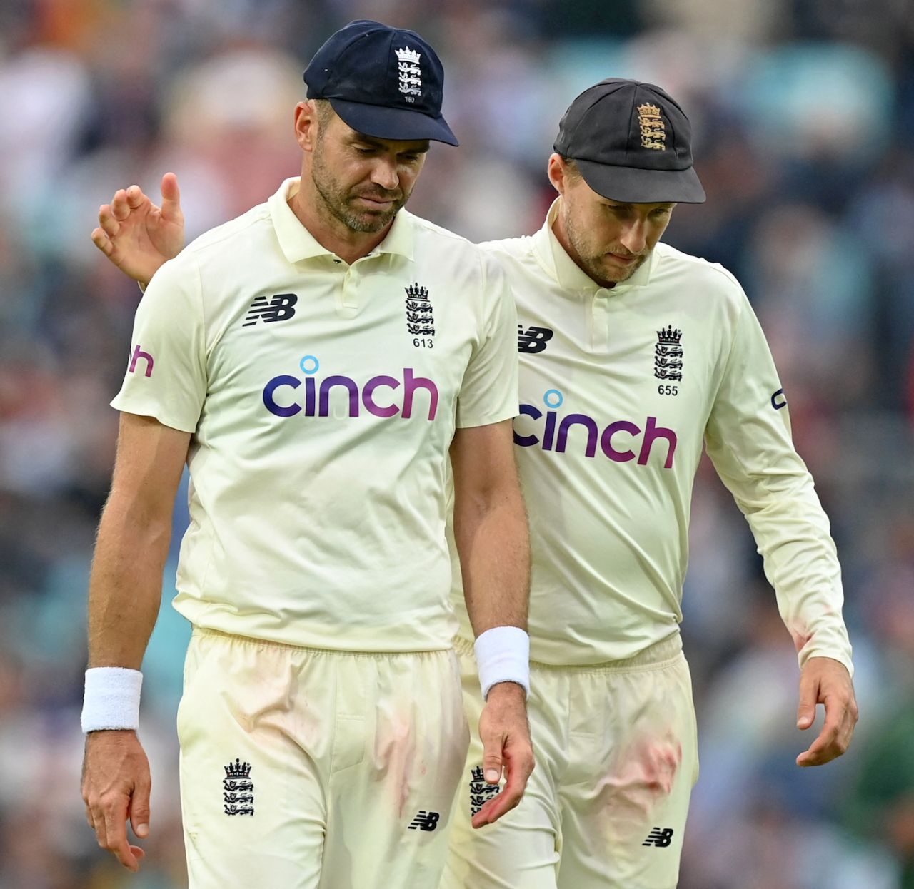 Joe Root and James Anderson walk off as players leave the field at The Oval, London, September 4, 2021